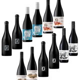 A group of wine bottles arranged on a plain white background, including several dark bottles with labels and a few lighter bottles with blue, white, and scenic illustrations on the labels.