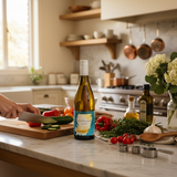 Bottle of Aphelion Callow Grenache Blanc wine with a label showing a close-up of a white flower, against a plain background.