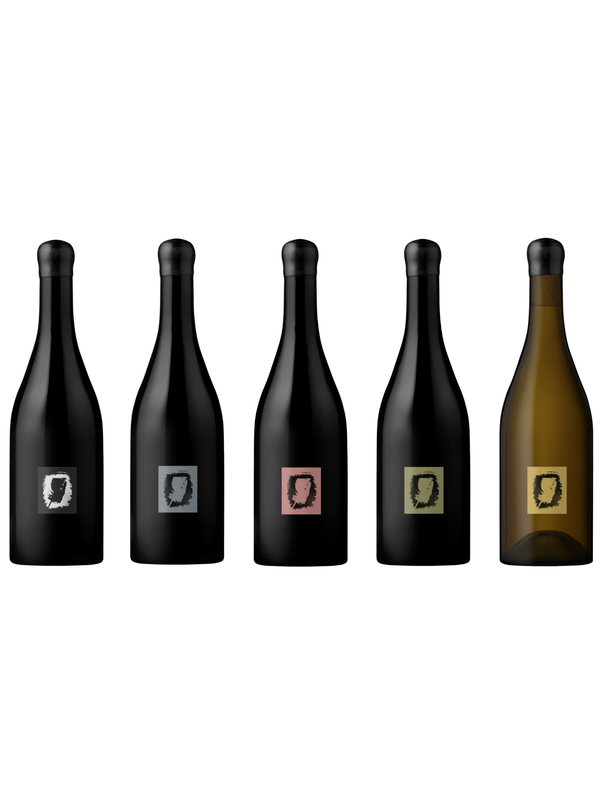 Five wine bottles with varying colored labels on a white background