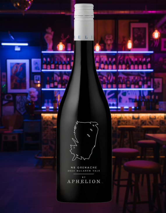 Bottle of NB Grenache by Aphelion 2024 wine with a label that includes the outline of a feather and the name of the wine. The dark glass bottle is upright and the wine inside is not visible.