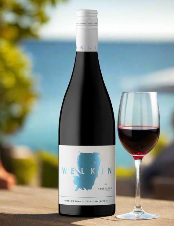 A bottle of Welkin Nero d'Avola by Aphelion 2024 wine with a purple label, blue text, and a map outline.