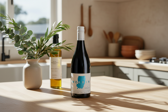 A bottle of Welkin Nero d'Avola by Aphelion 2024 wine with a purple label, blue text, and a map outline.