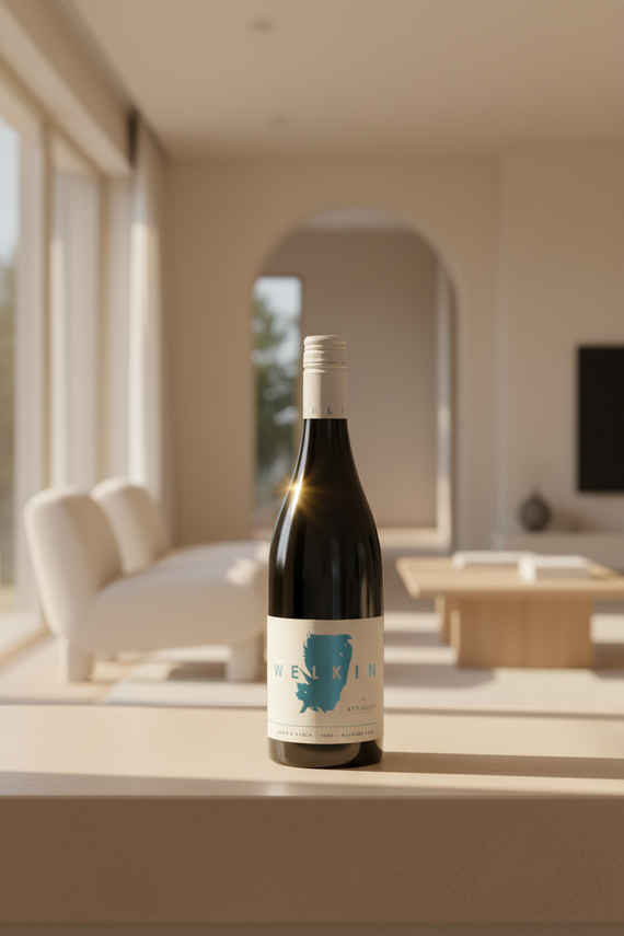 A bottle of Welkin Nero d'Avola by Aphelion 2024 wine with a purple label, blue text, and a map outline.