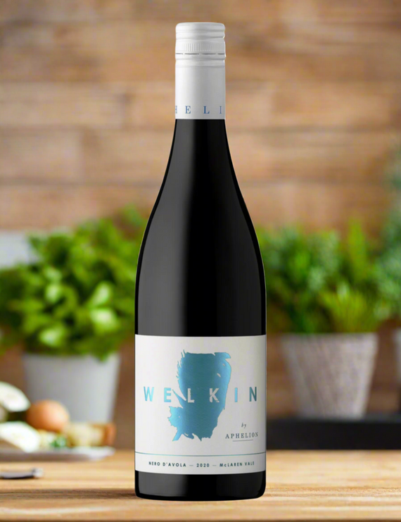 A bottle of Welkin Nero d'Avola by Aphelion 2024 wine with a purple label, blue text, and a map outline.